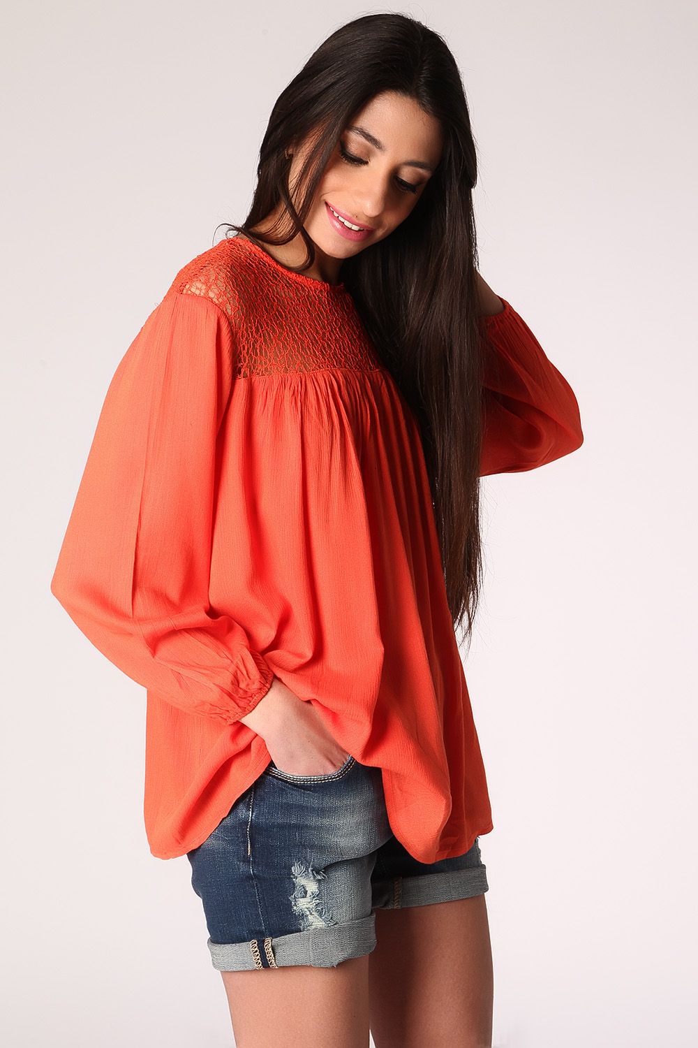 Blusa amplia con detalle de rejilla en color naranja Q2