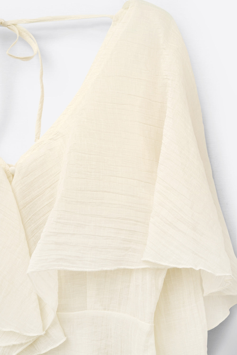 blusa corta de gasa fluida con mangas largas Q2