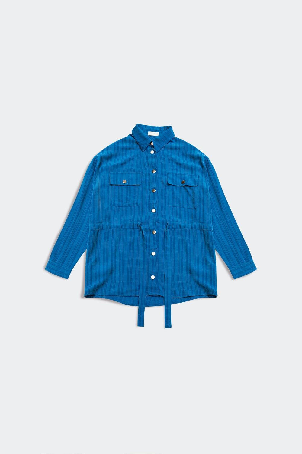 Camisa azul de manga larga con lazada en la cintura Q2