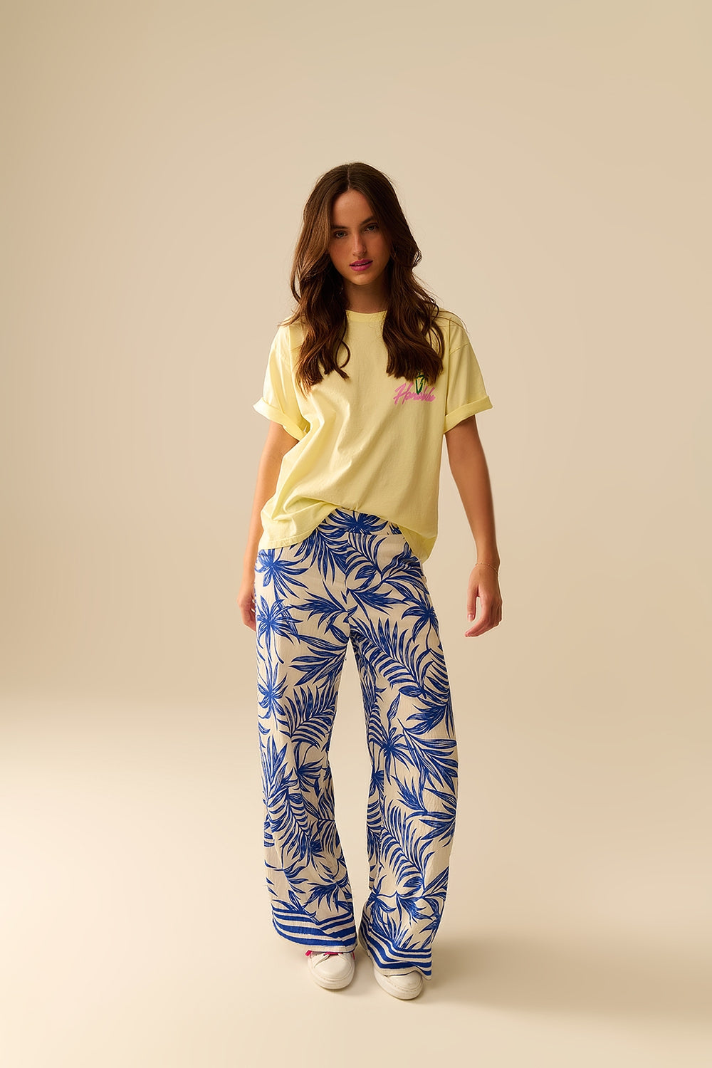 Camiseta amarilla hecha en Italia con gráfico de Honolulu Q2