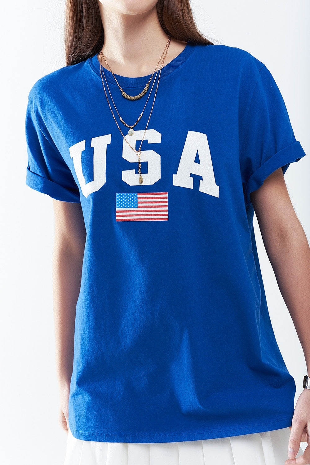 Camiseta larga holgada azul con logotipo de USA Q2