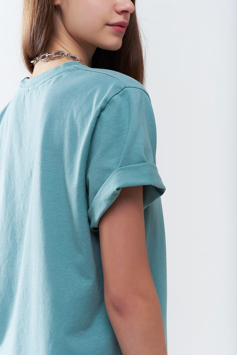Camiseta larga suelta verde con logotipo de USA Q2