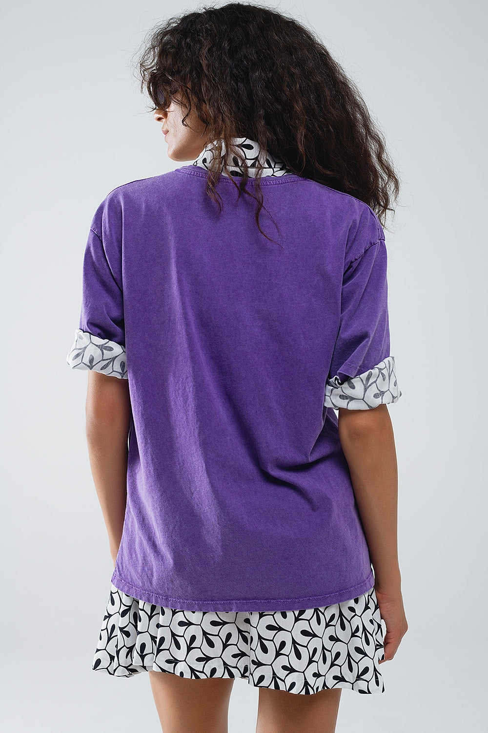 Camiseta morada con texto manhattan Q2