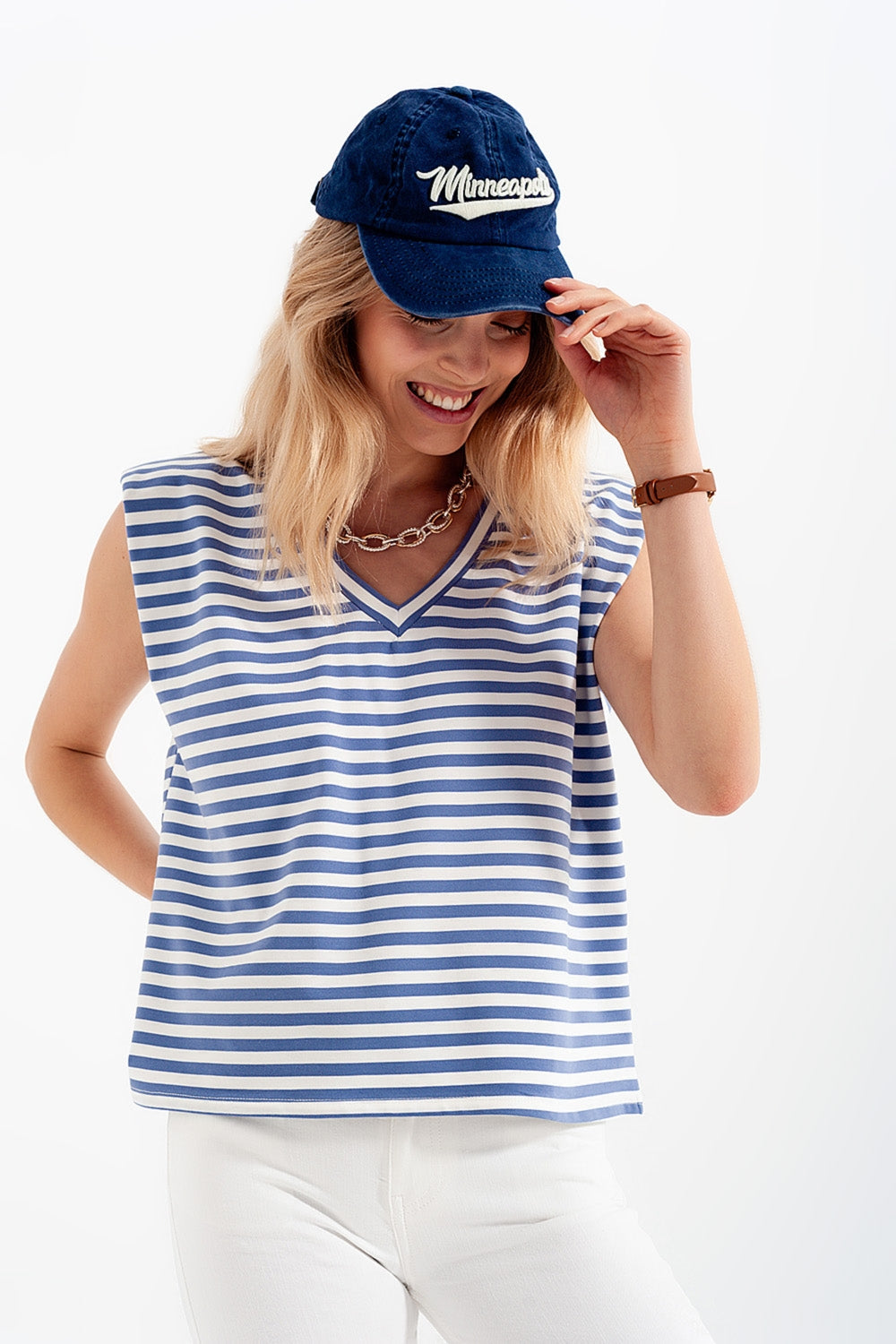 Camiseta sin mangas con hombreras y diseño de rayas en azul Q2