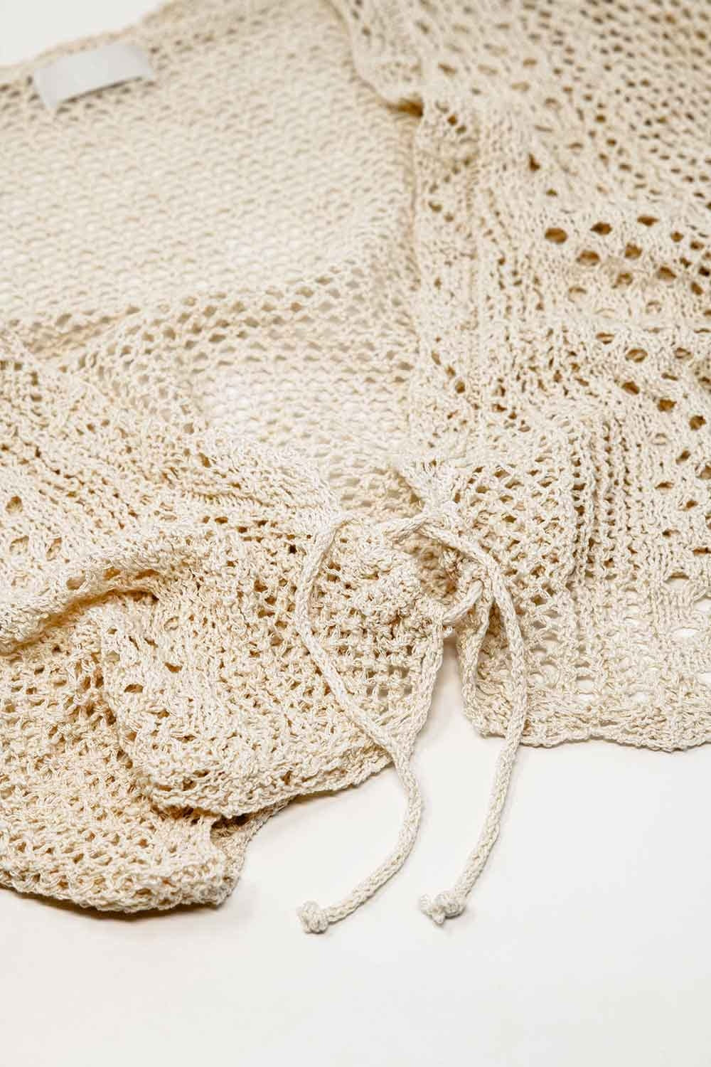 Chaqueta de punto beige con cierre de lazo Q2