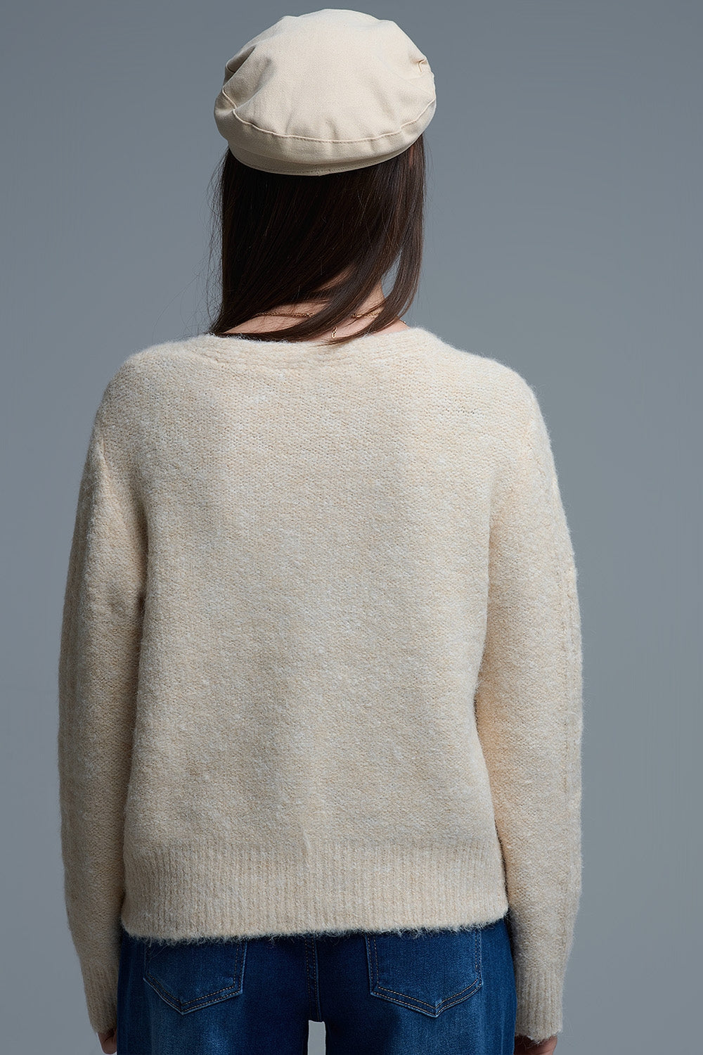 Chaqueta de punto beige con flores bordadas Q2