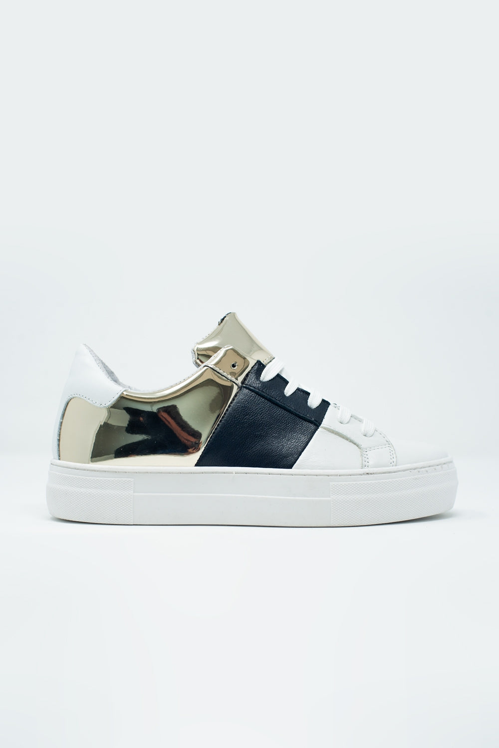 Chunky sneakers en negro y dorado Q2