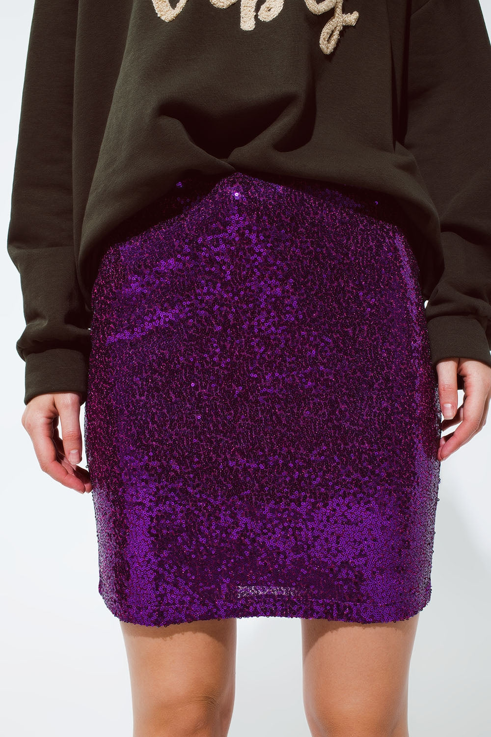 Falda mini de lentejuelas en color morado Q2