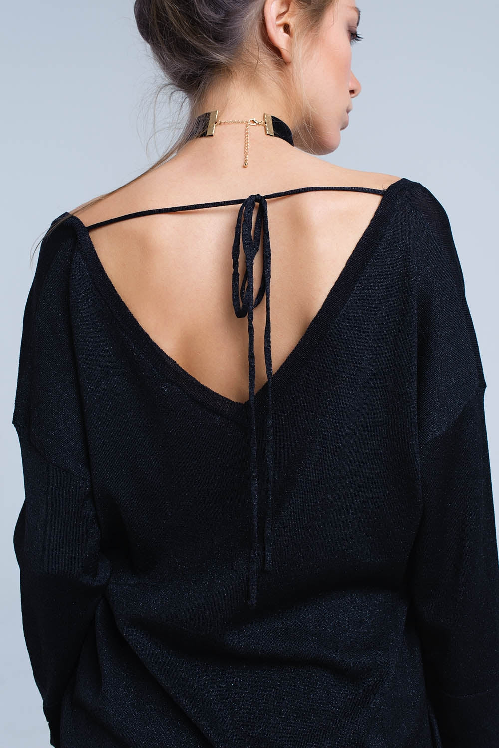 Jersey de punto negro con detalle de lurex dorado Q2