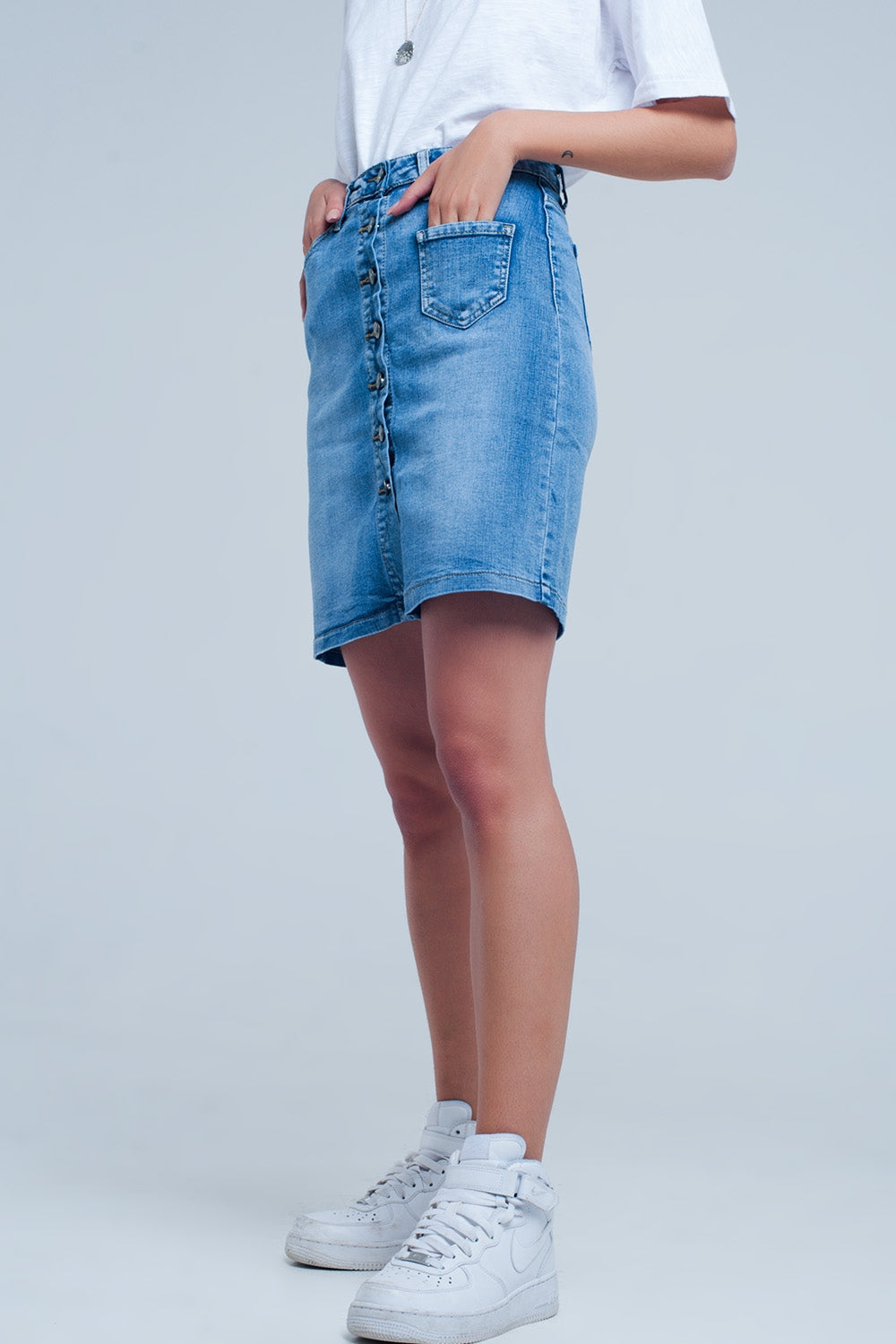 Minifalda vaquera azul con diseño abotonado Q2
