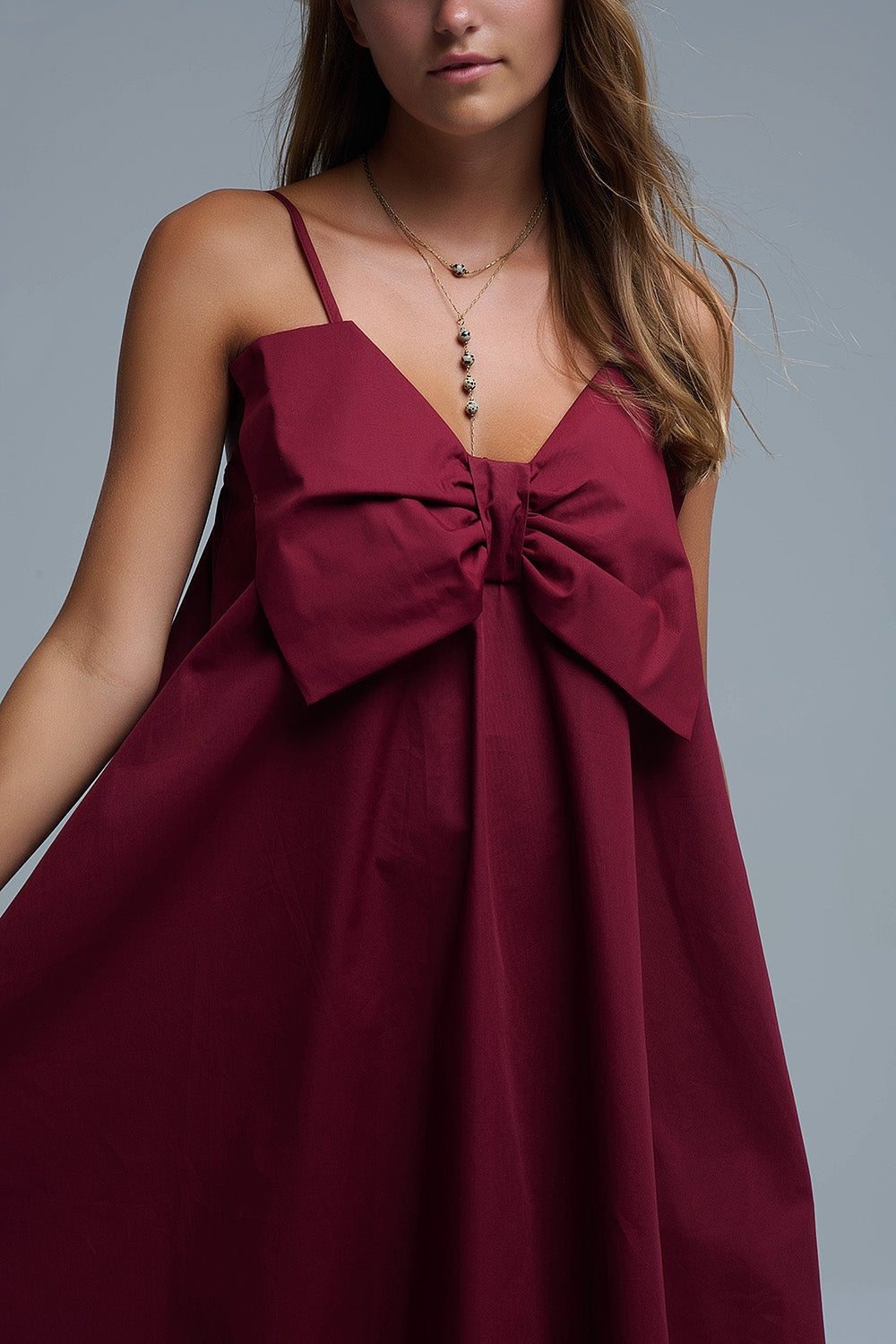 Minivestido de popelina burdeos con detalle de gran lazo Q2