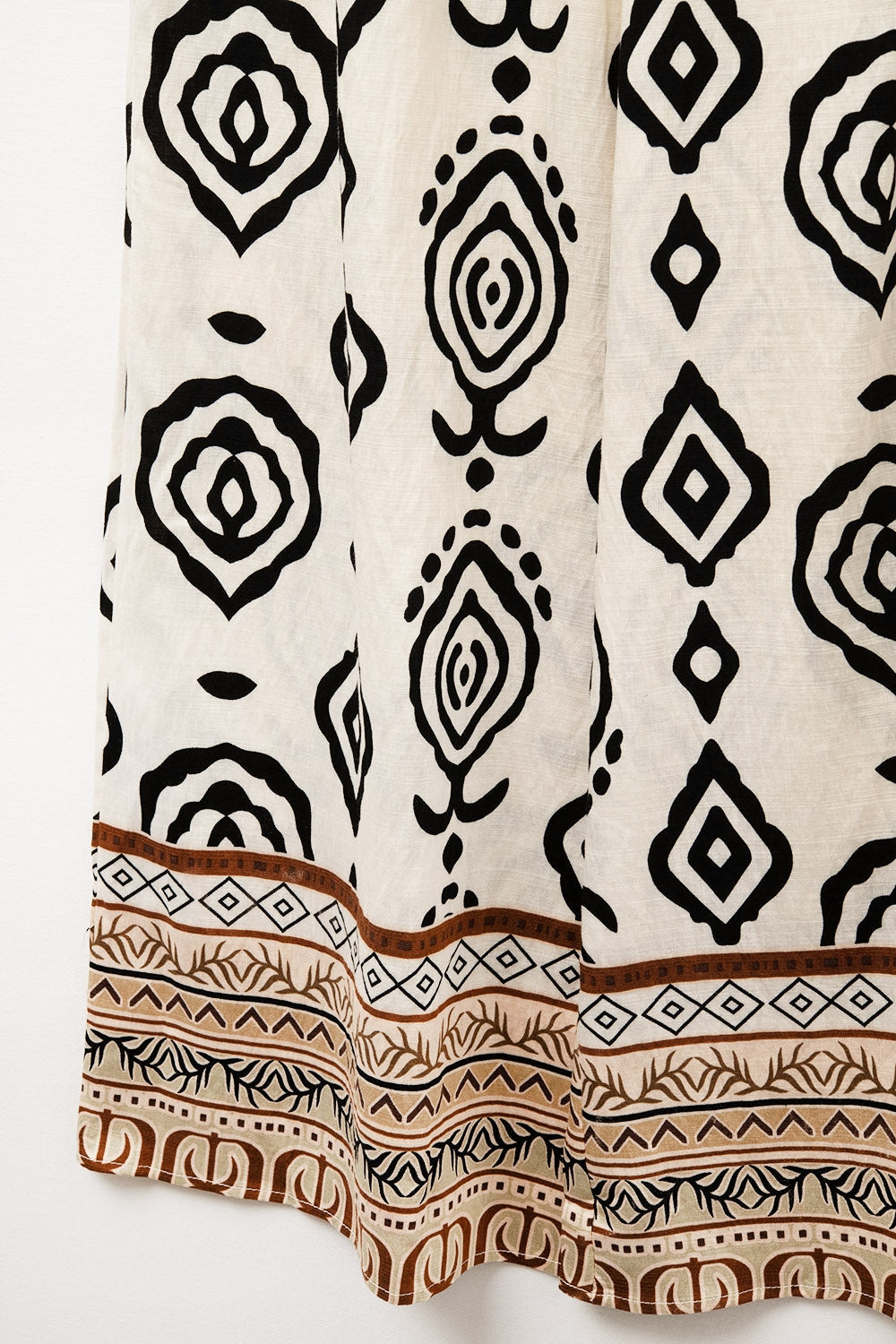 Pantalones anchos crema con estampado boho Q2
