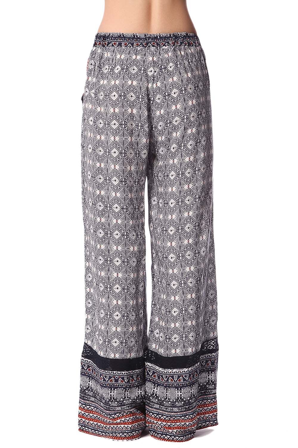 Pantalones de pernera amplia con estampado etnico azul y detalle de puntilla Q2