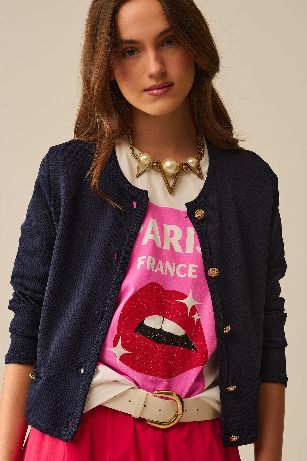 Q2 Rebeca azul marino con botones dorados