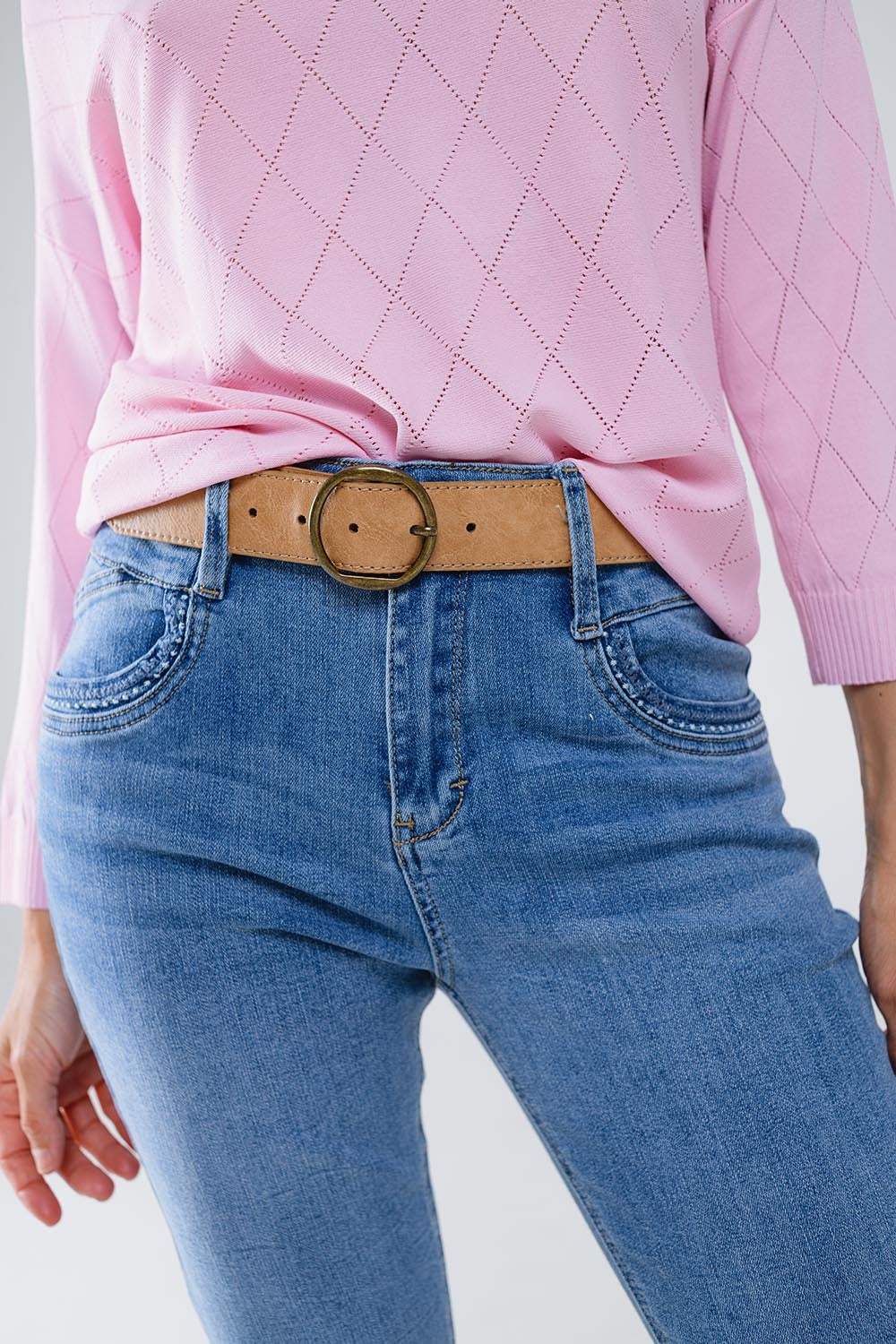 Skinny Jeans En lavado claro con detalle en el bolsillo Q2