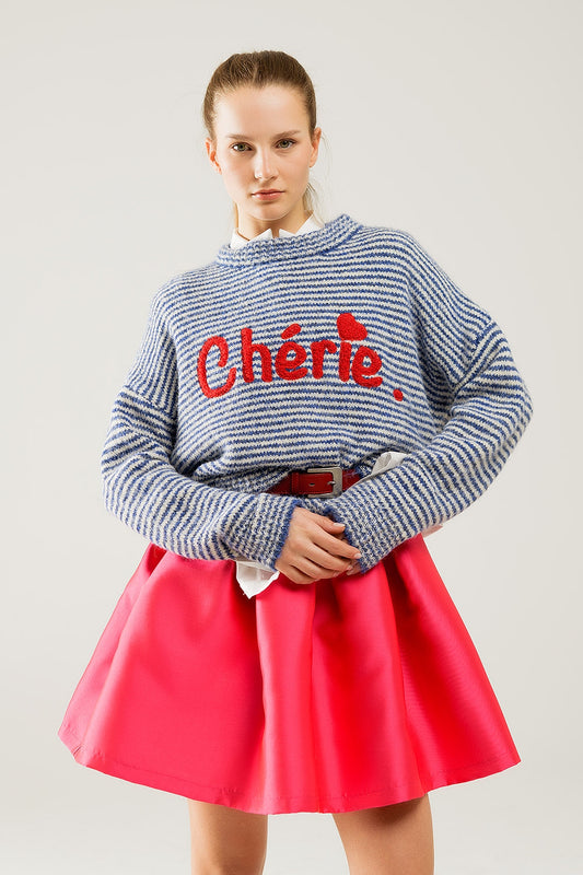 Q2 Suéter holgado de rayas gruesas en azul y blanco