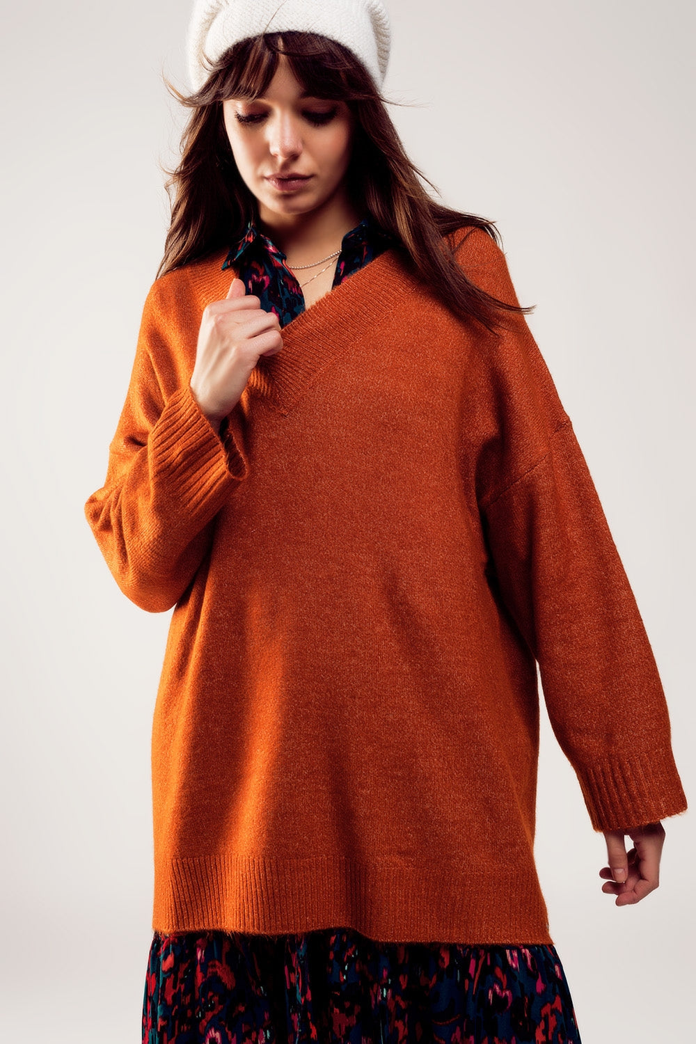 Sueter vestido de pico extragrande en color naranja Q2
