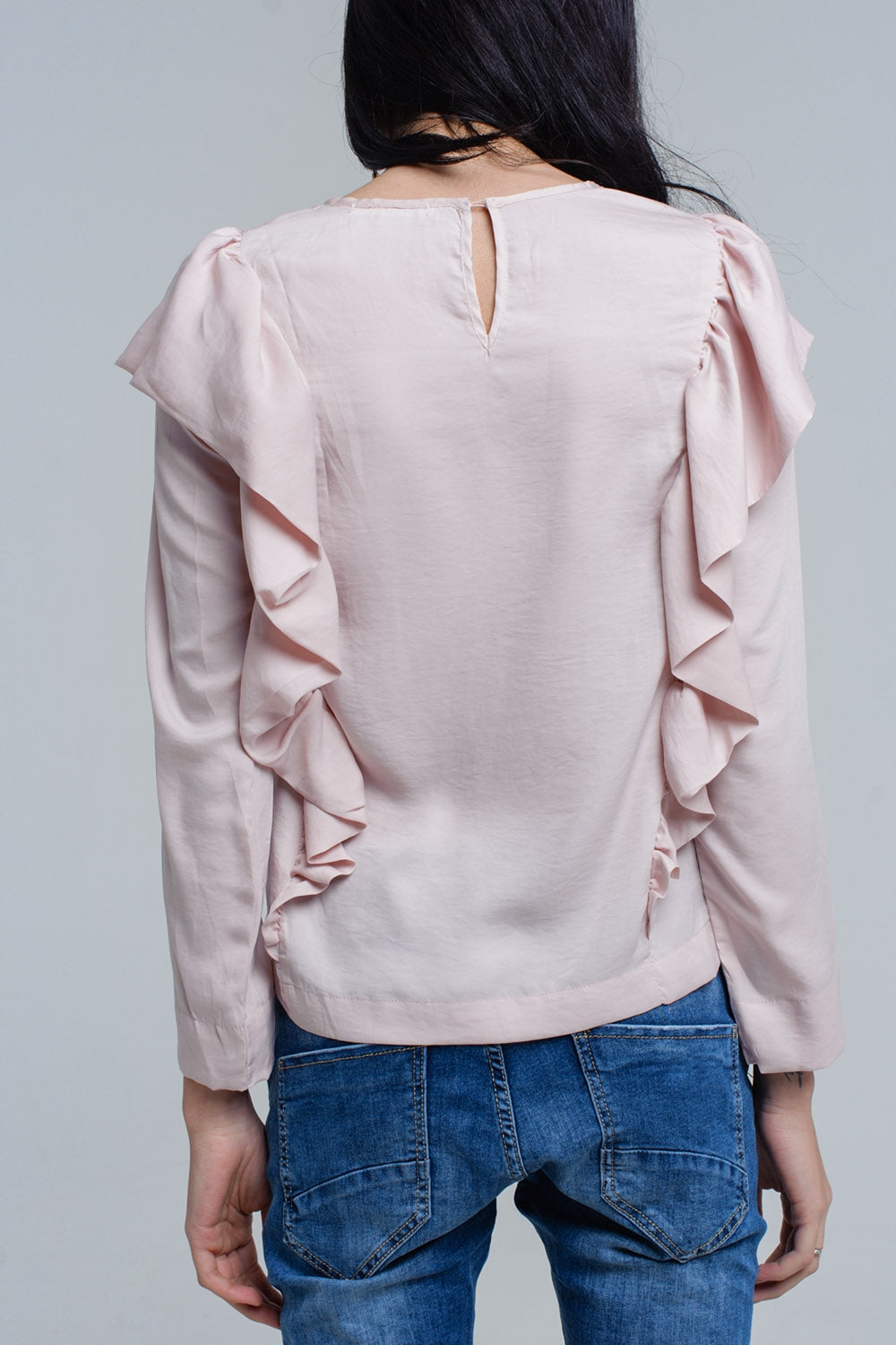 Top con detalle de volantes en rosa palo Q2