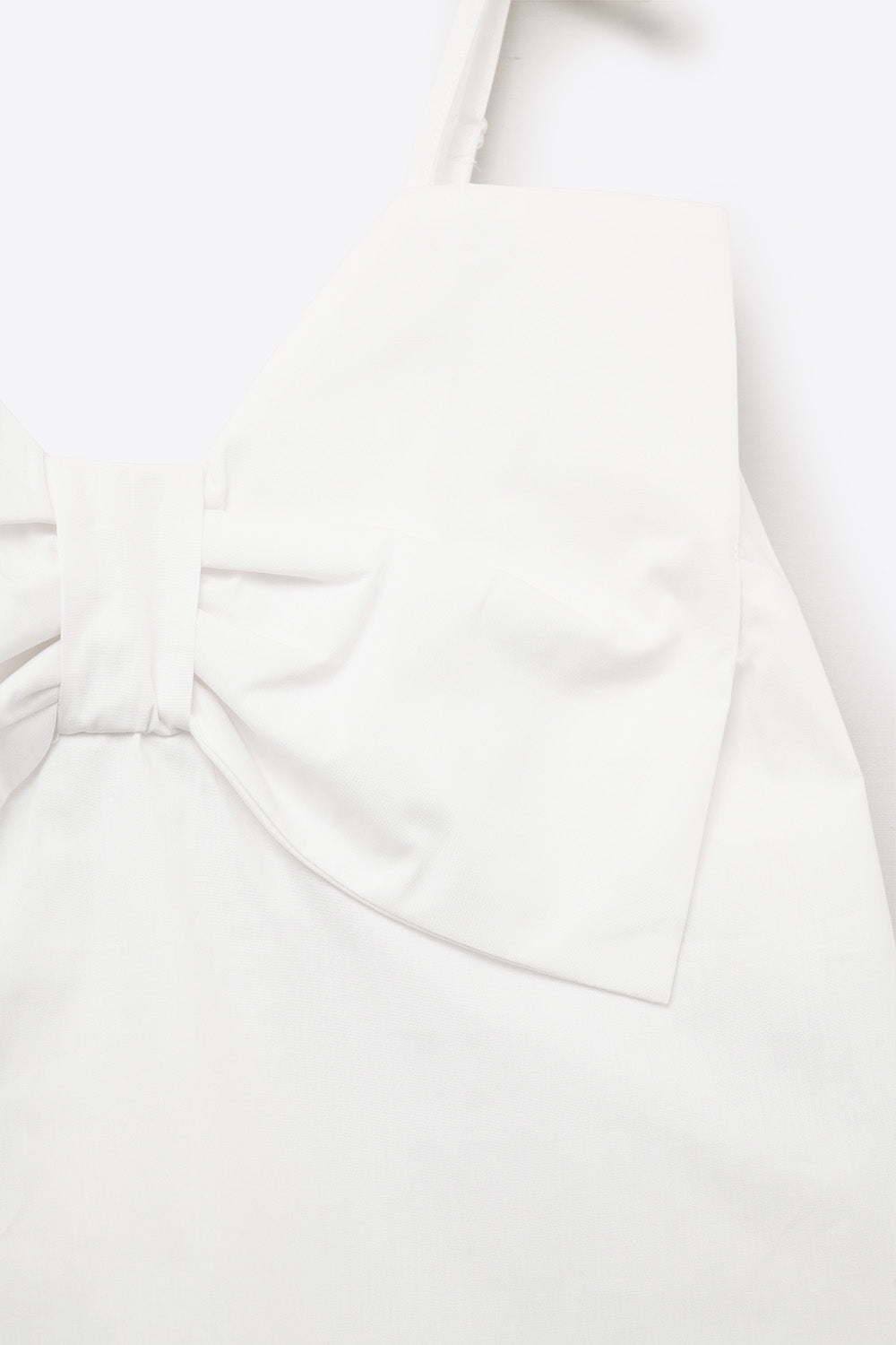 Top de popelín blanco con detalle de lazo Q2