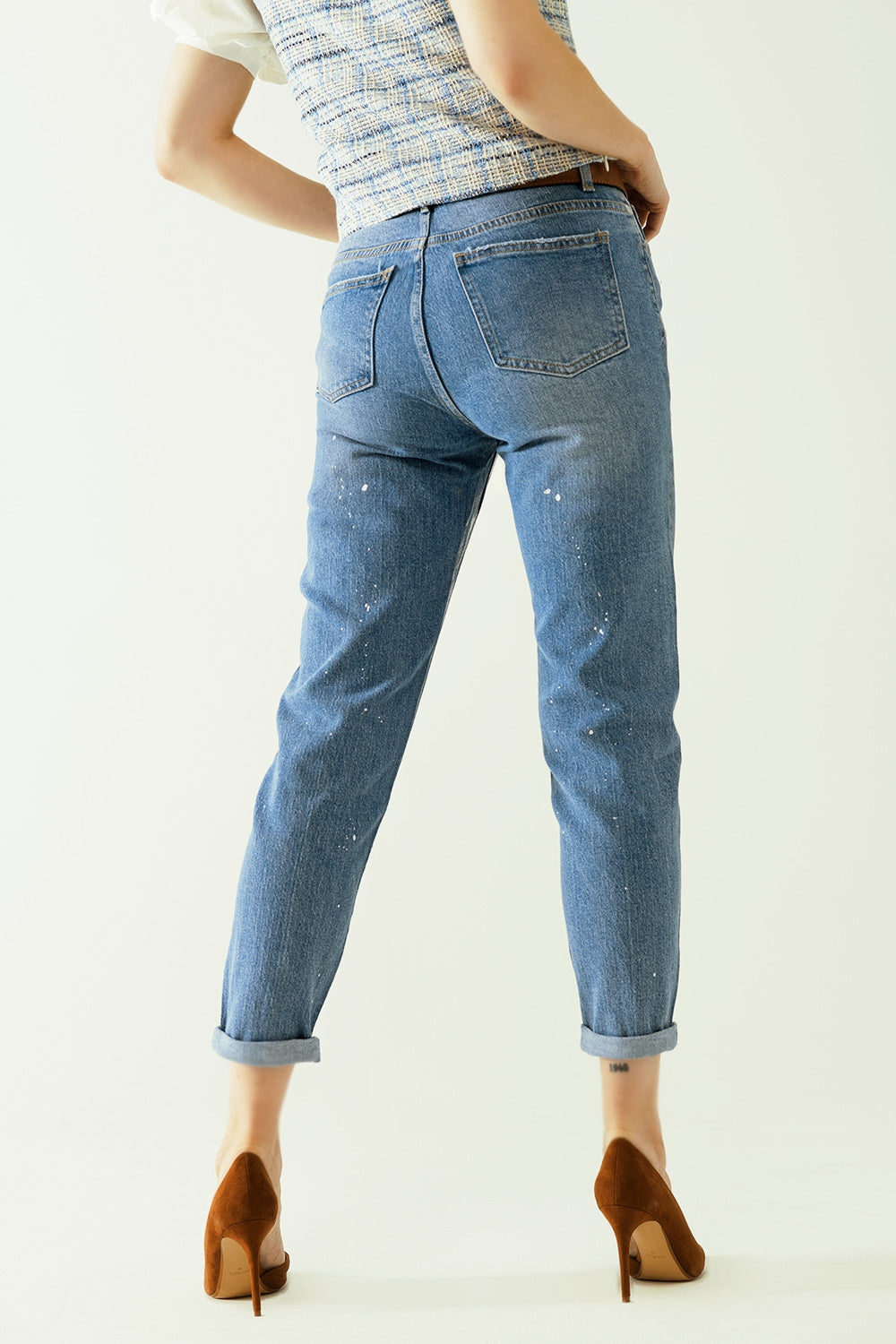 Vaqueros azules skinny con acabado metalizado en lavado claro Q2