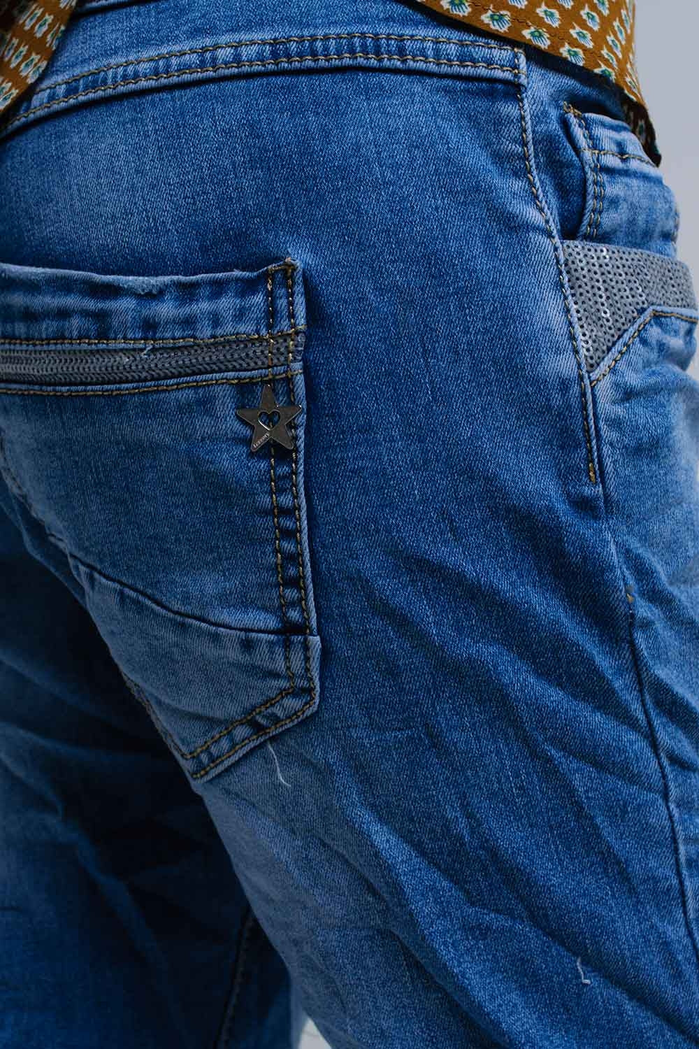 Vaqueros pitillo azules con detalles de lentejuelas Q2