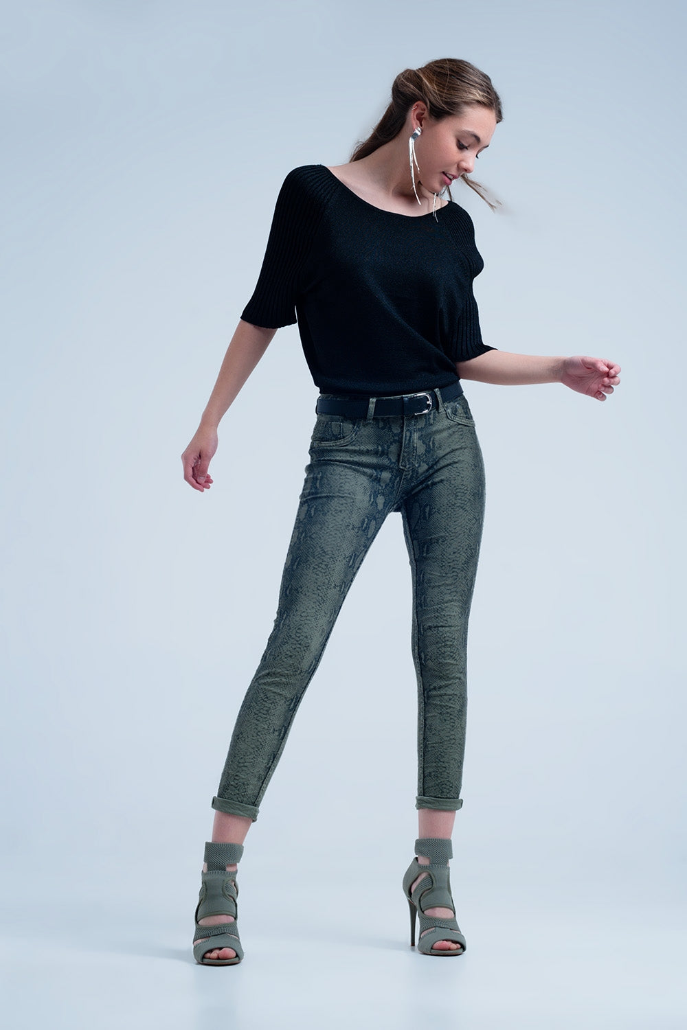 Vaqueros reversibles verdes con estampado de serpiente Q2