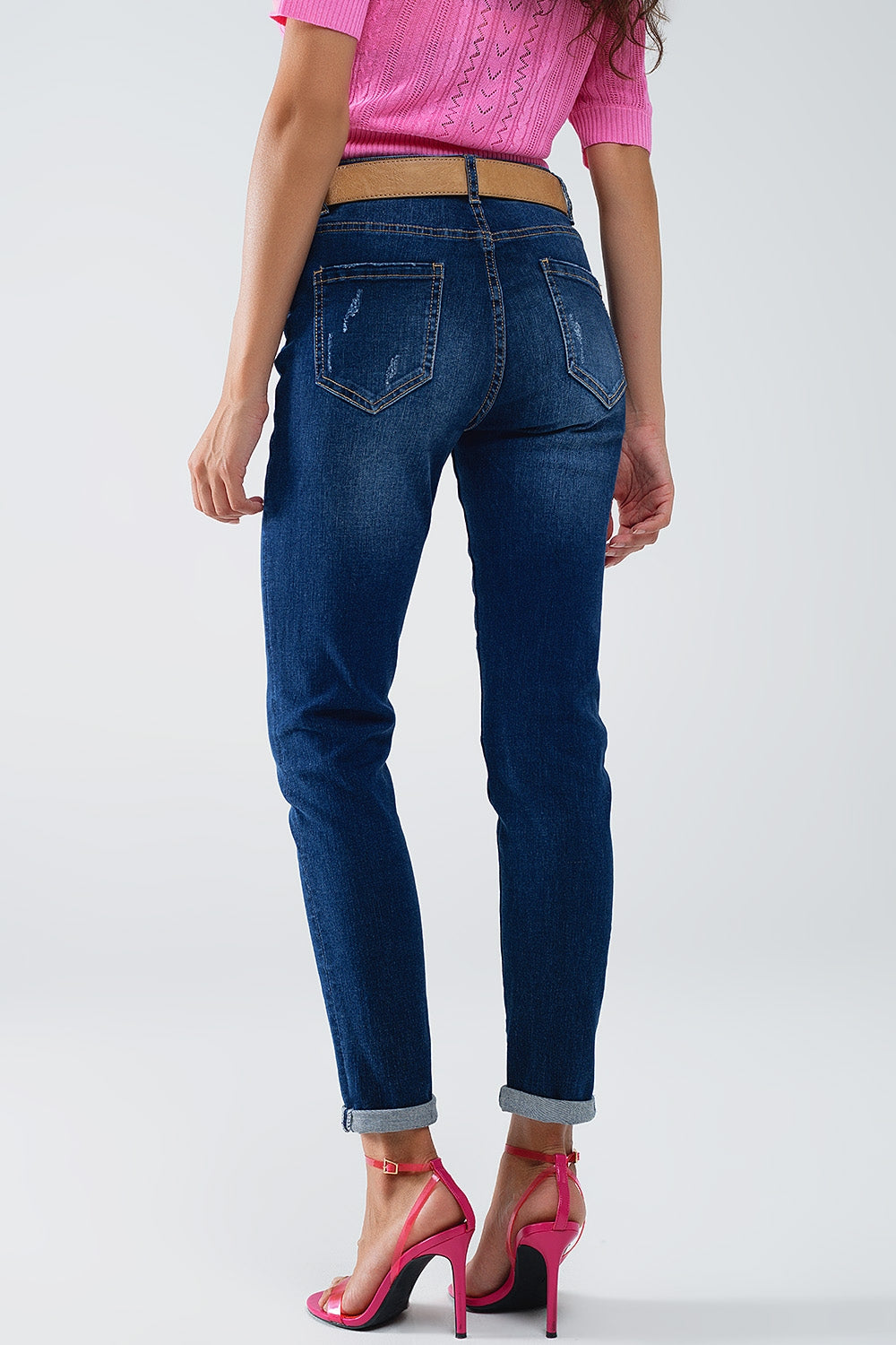 Vaqueros super ajustados desgastados en denim elástico con lavado oscuro Q2