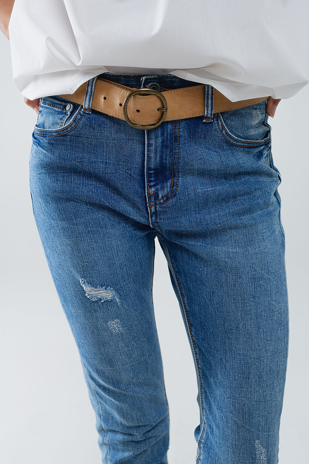 Vaqueros super ajustados en denim elástico con detalles desgastados Q2