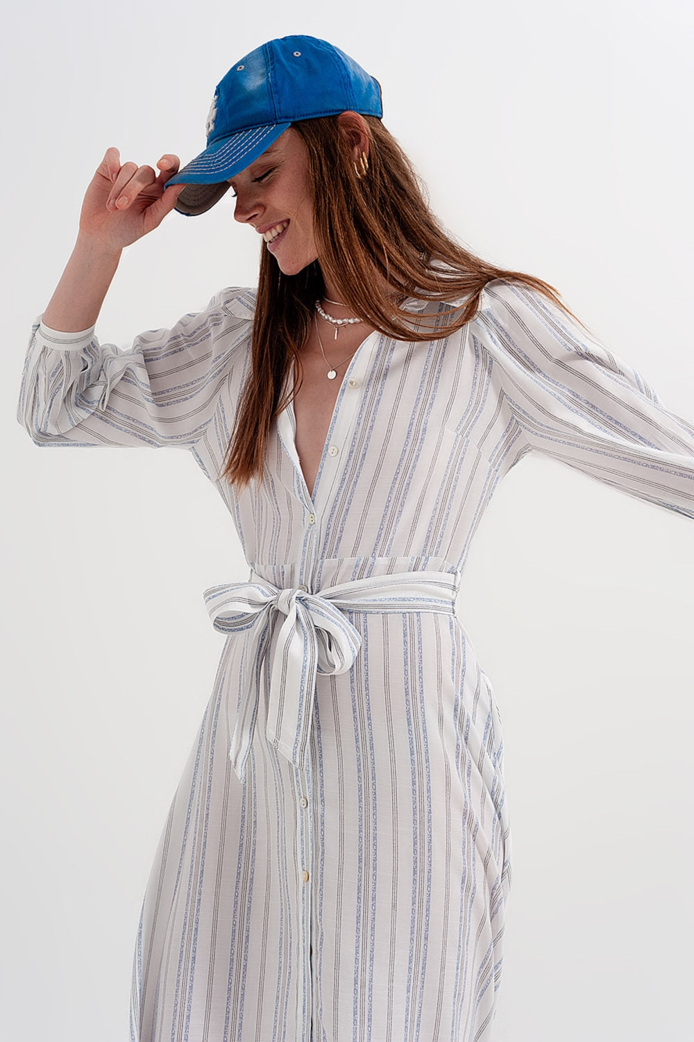 Vestido amplio con botones y diseño a rayas Q2