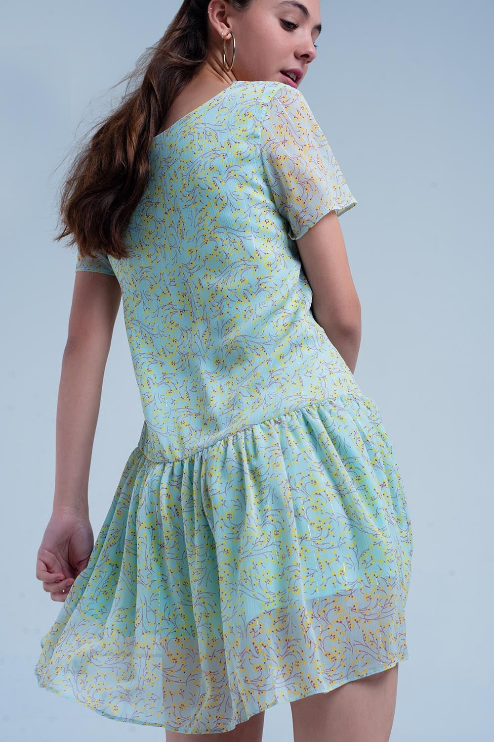 Vestido verde estampado con falda plisada Q2