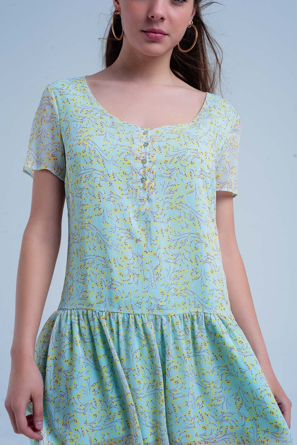 Vestido verde estampado con falda plisada Q2