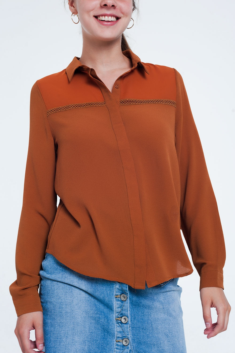 Blusa caldera con aplicación en el pecho Q2
