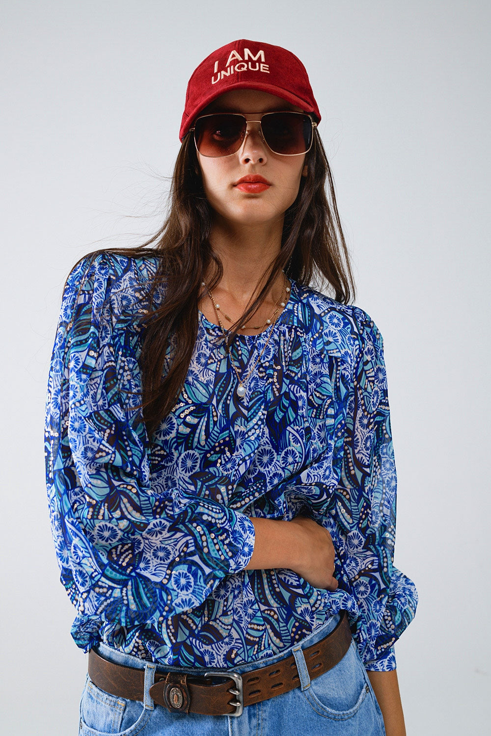 Blusa con estampado abstracto y mangas globo en azul Q2