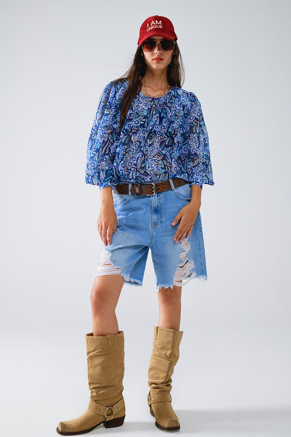 Blusa con estampado abstracto y mangas globo en azul Q2