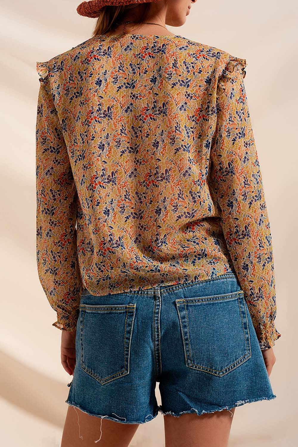 Blusa con estampado floral metalizado en verde Q2