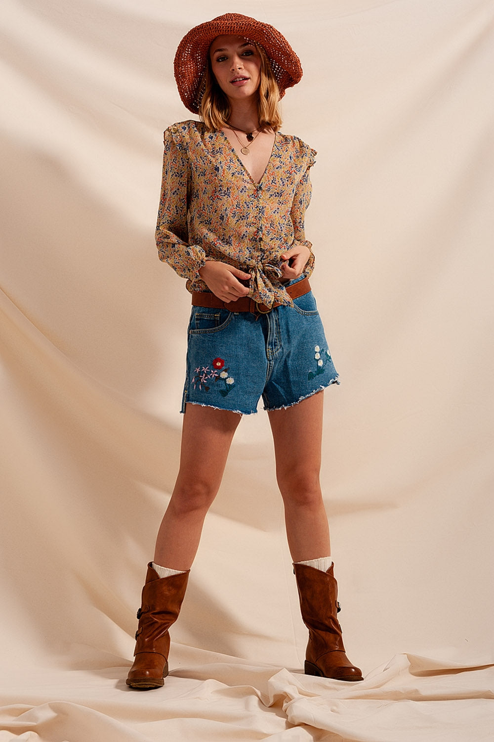 Blusa con estampado floral metalizado en verde Q2