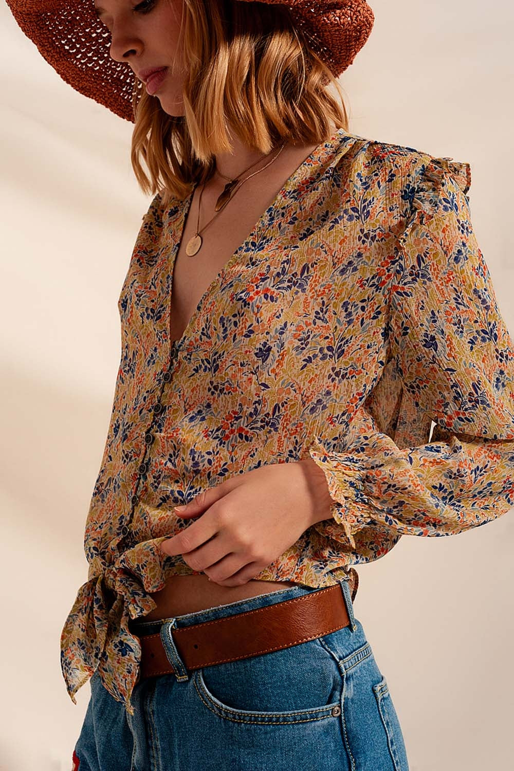 Blusa con estampado floral metalizado en verde Q2