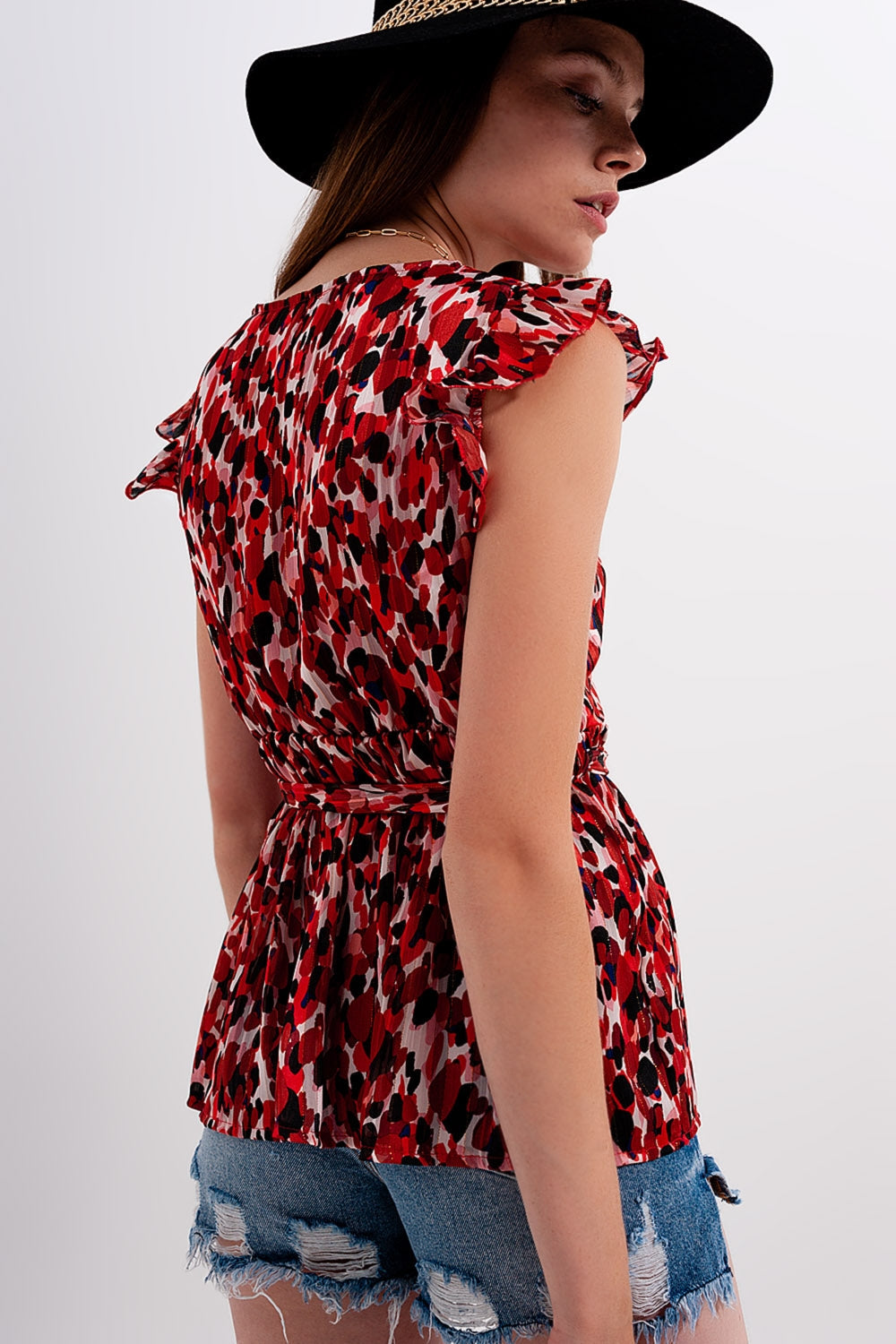 Blusa de gasa con estampado animal y detalle de volante Q2