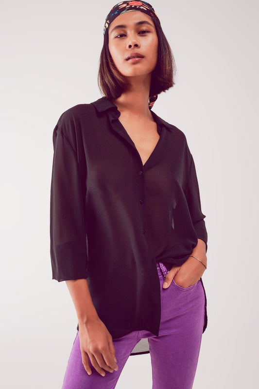 Q2 Camisa negra de chifón transparente
