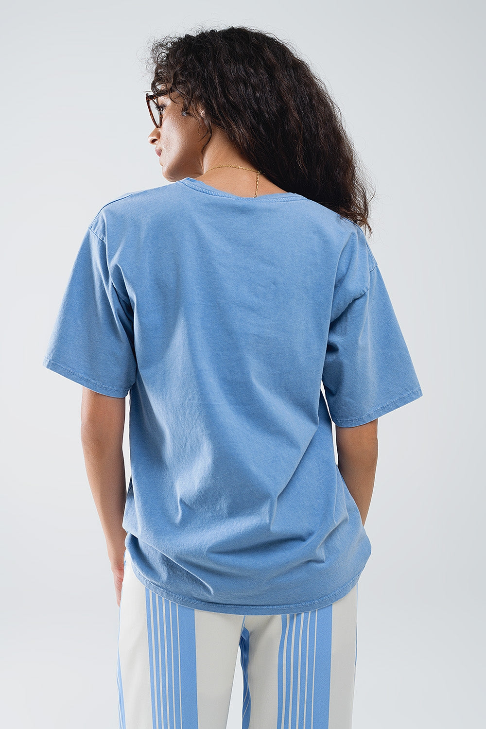 Camiseta azul con texto manhattan Q2