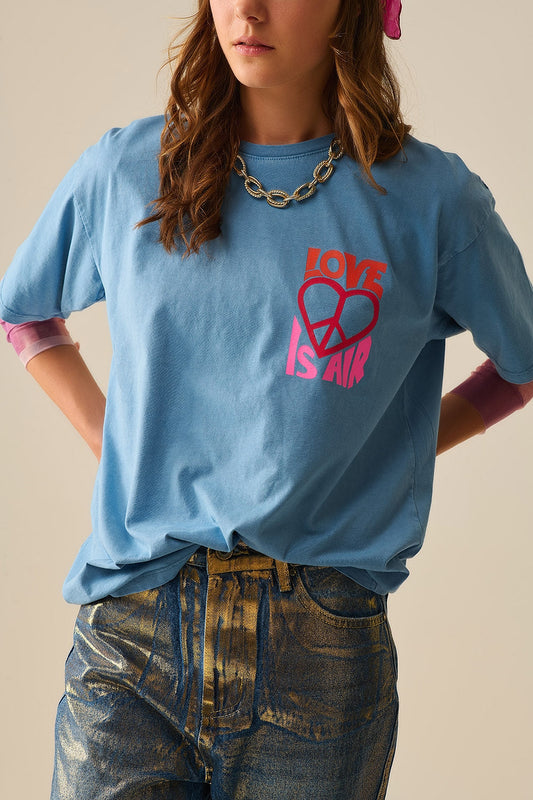 Camiseta azul made in italy con logo Love is Air y Corazón con Paz Q2