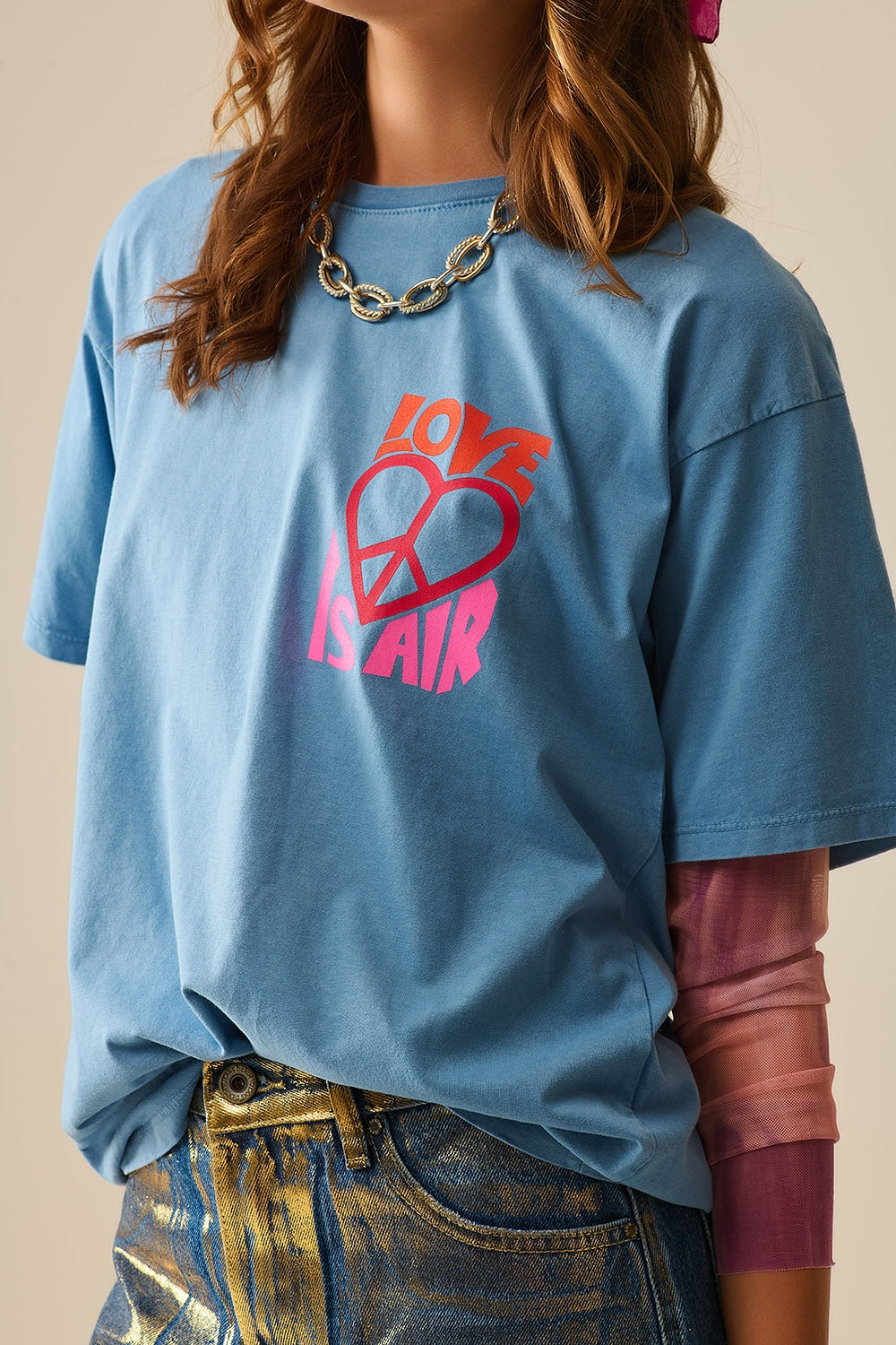 Camiseta azul made in italy con logo Love is Air y Corazón con Paz Q2
