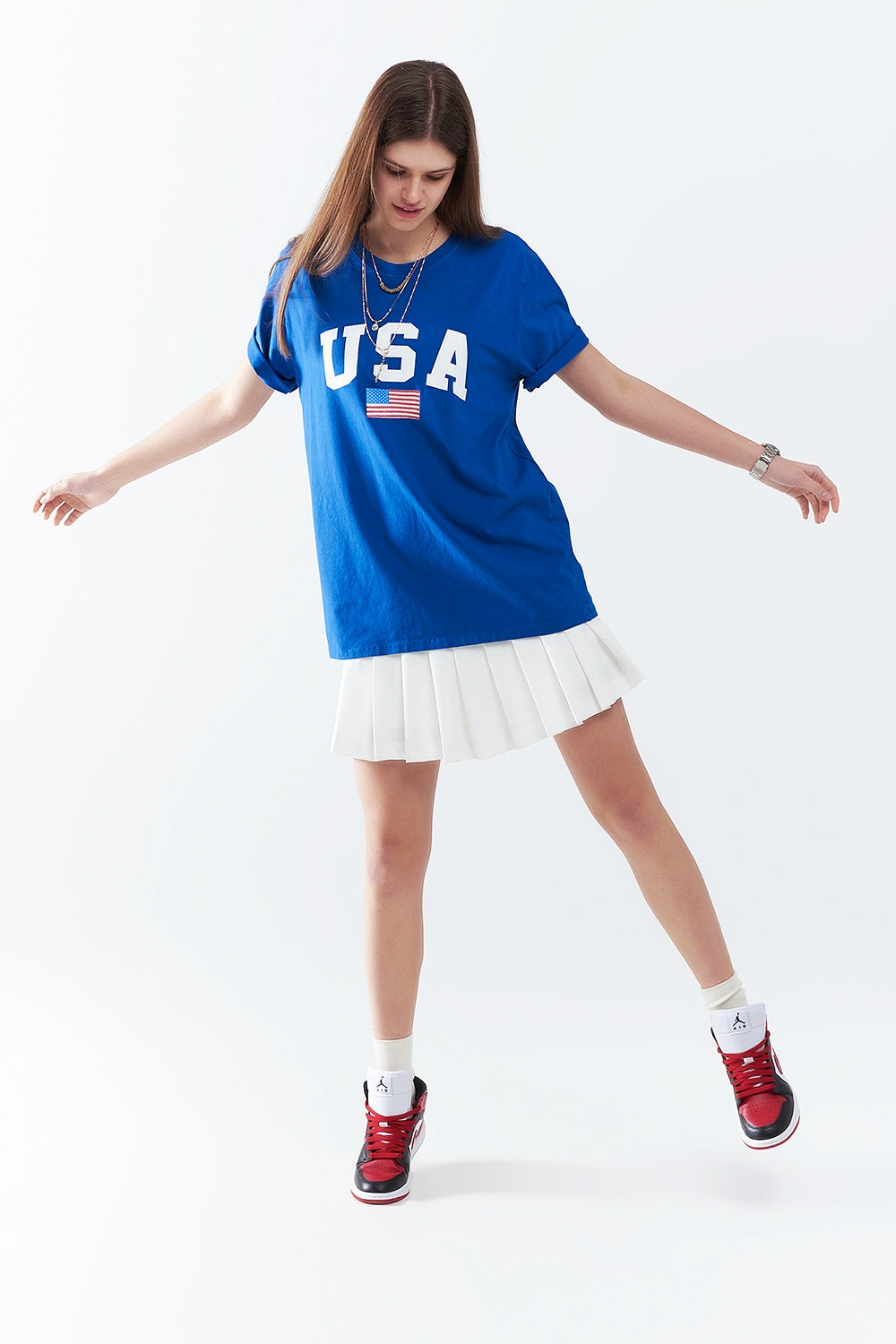 Camiseta larga holgada azul con logotipo de USA Q2