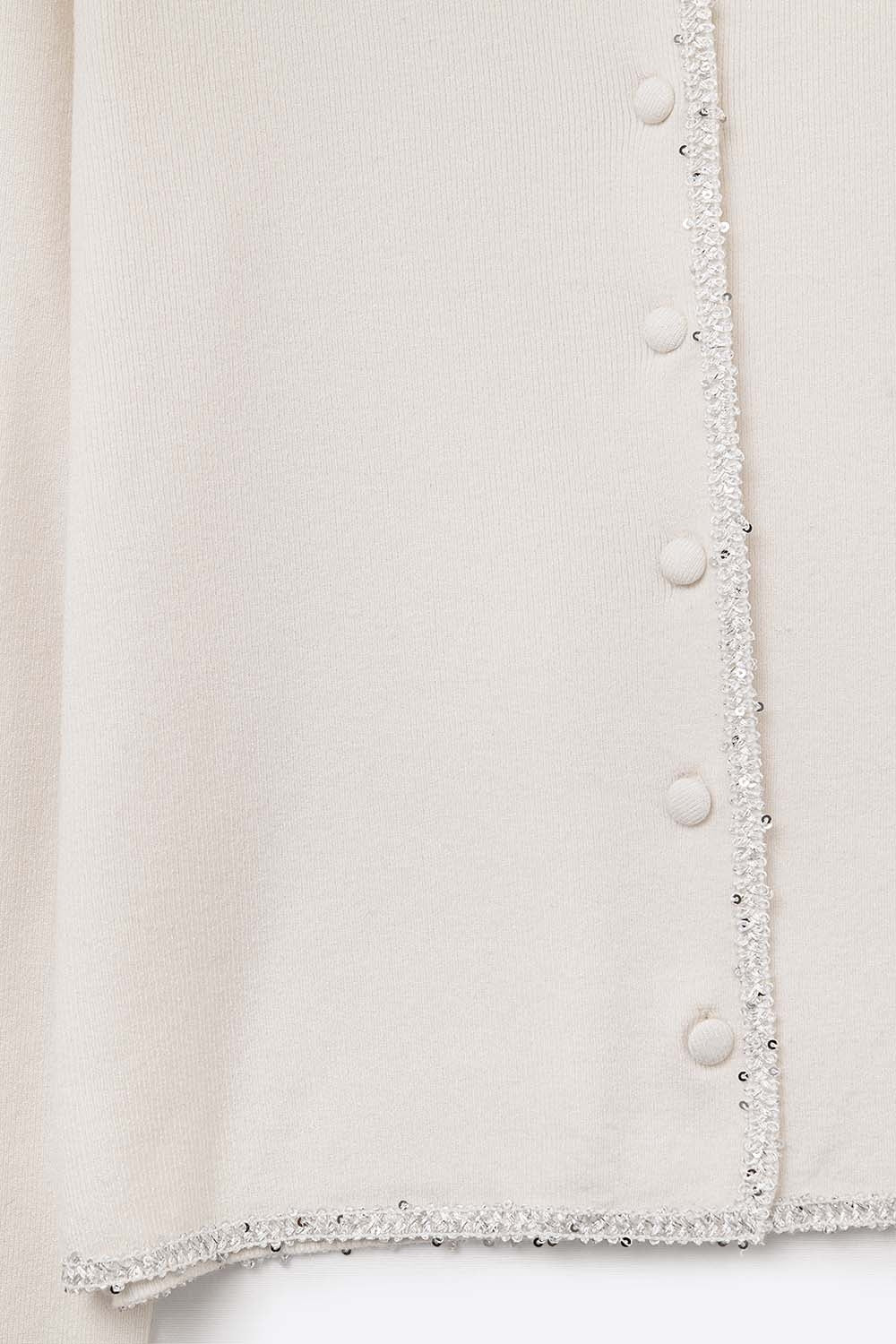 cárdigan blanco de punto fino con detalle de strass Q2