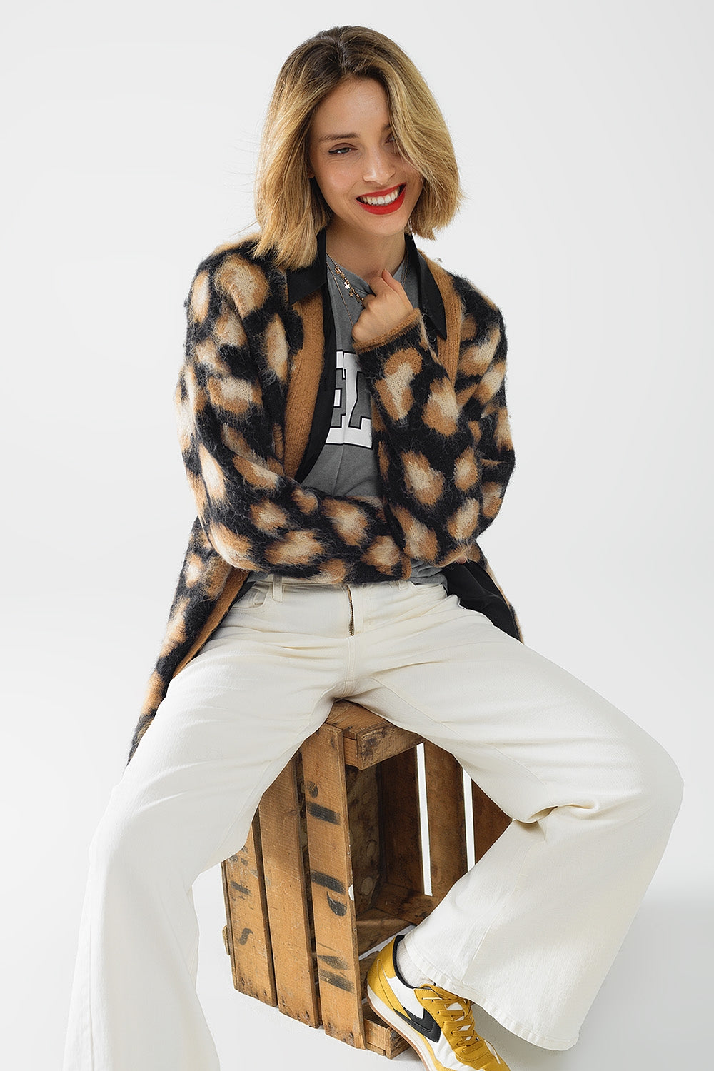 cárdigan negro con estampado de leopardo de punto con lana Q2