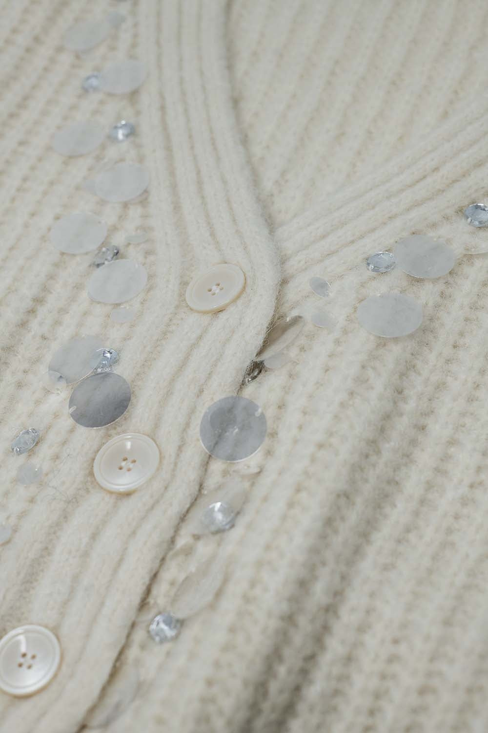 Chaqueta de punto grueso con detalle de lentejuelas Q2