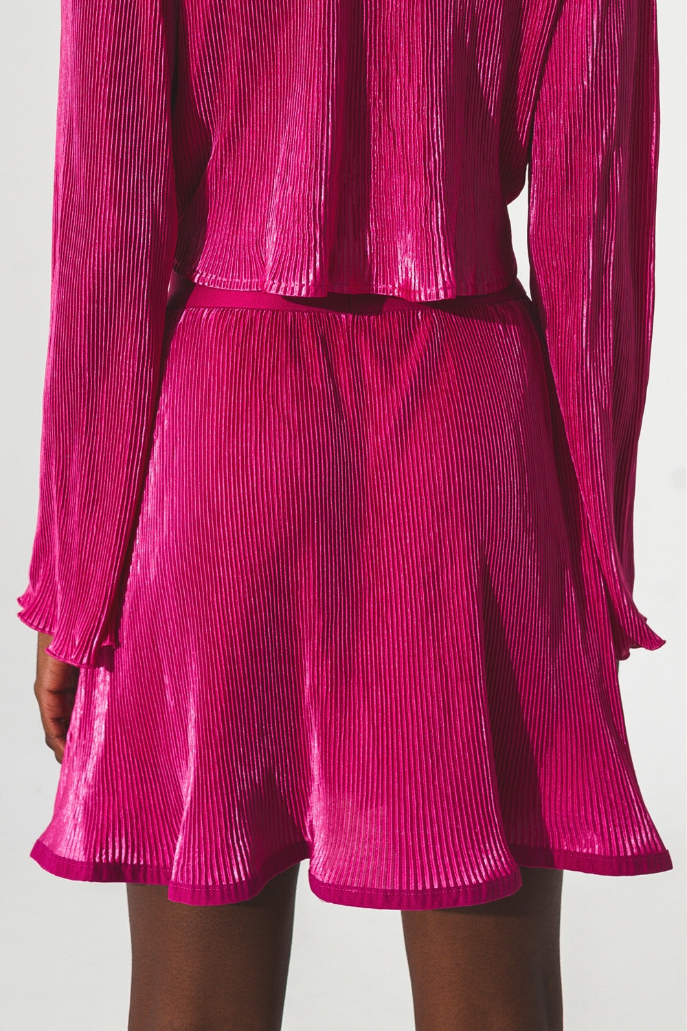 Falda corta plisada en Fucsia Q2