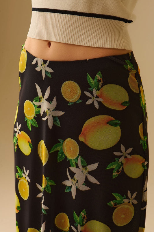 Falda midi negra ajustada con estampado de limón en tejido de malla Q2