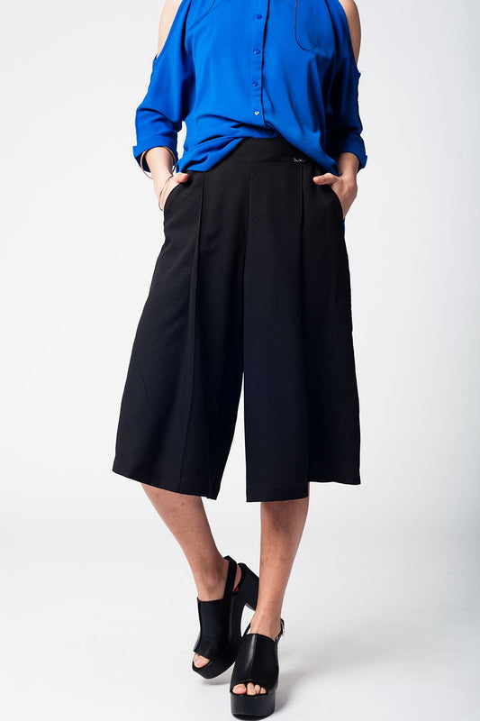 Q2 Falda pantalón negro con botones de plata
