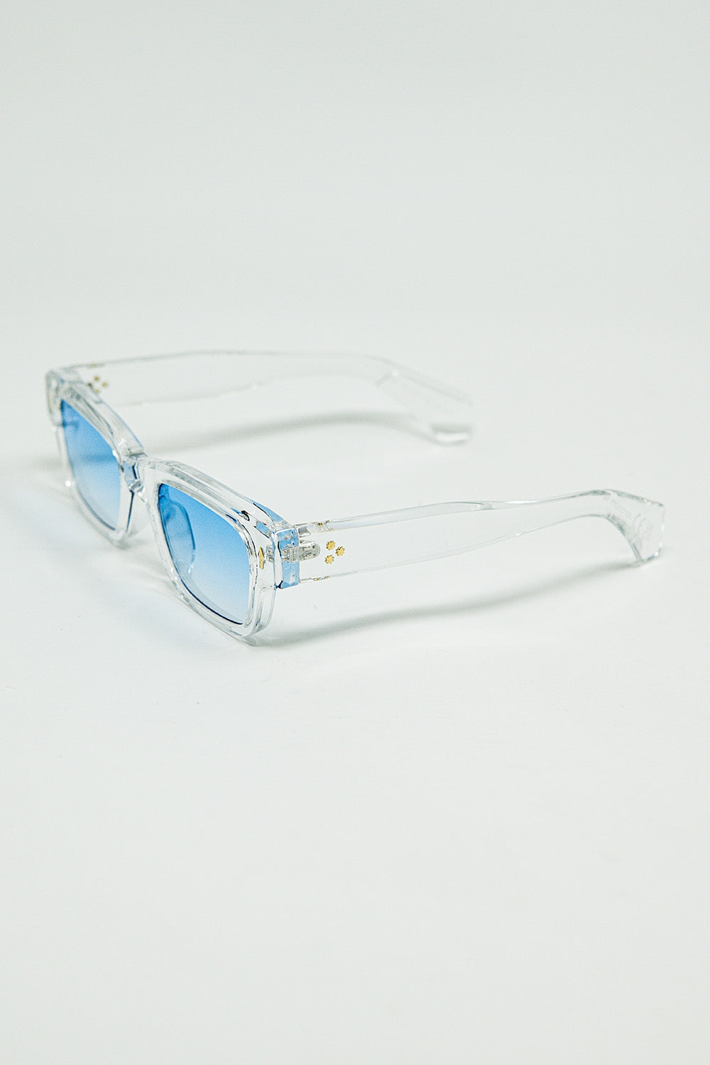 Gafas de sol blancas translúcidas con lentes ovaladas de color azul claro Q2